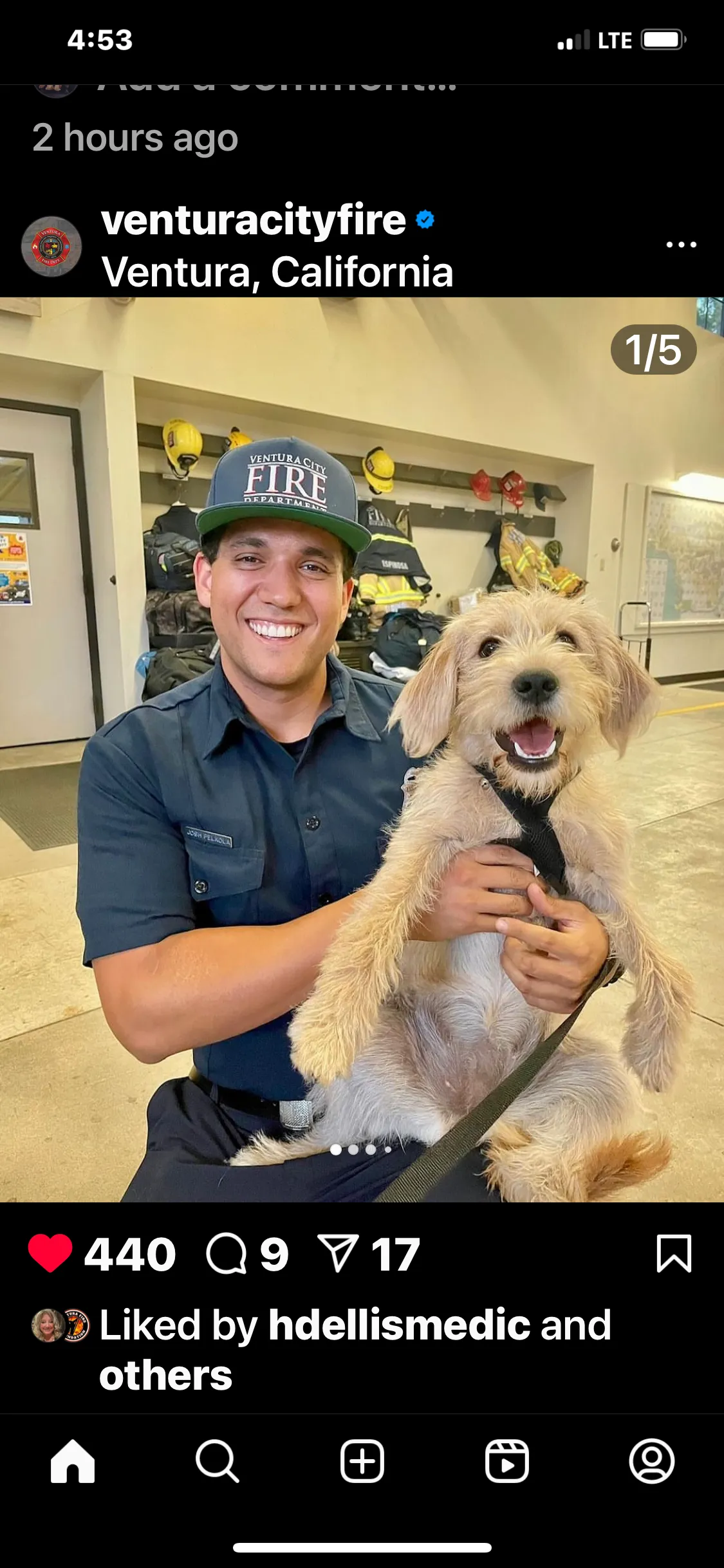 Firefighter with Facility dog Hope